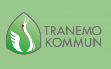 Tranemo kommuns logga på grön bakgrund